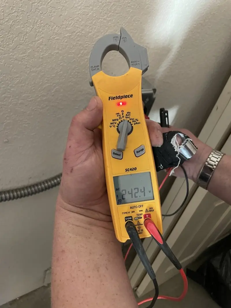 Voltage testing with clamp meter during Circuit Breaker Repair in Ashland